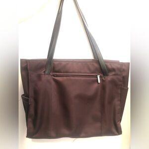New samsonite laptop and tablet tote bag in burgundy and leather straps.